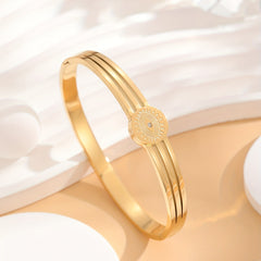 Golden Stainless Steel Bracelets with Rhinestone Eye Pattern