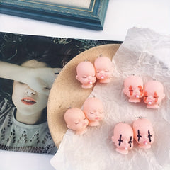 Exaggerated Hip Hop Doll Head Earrings