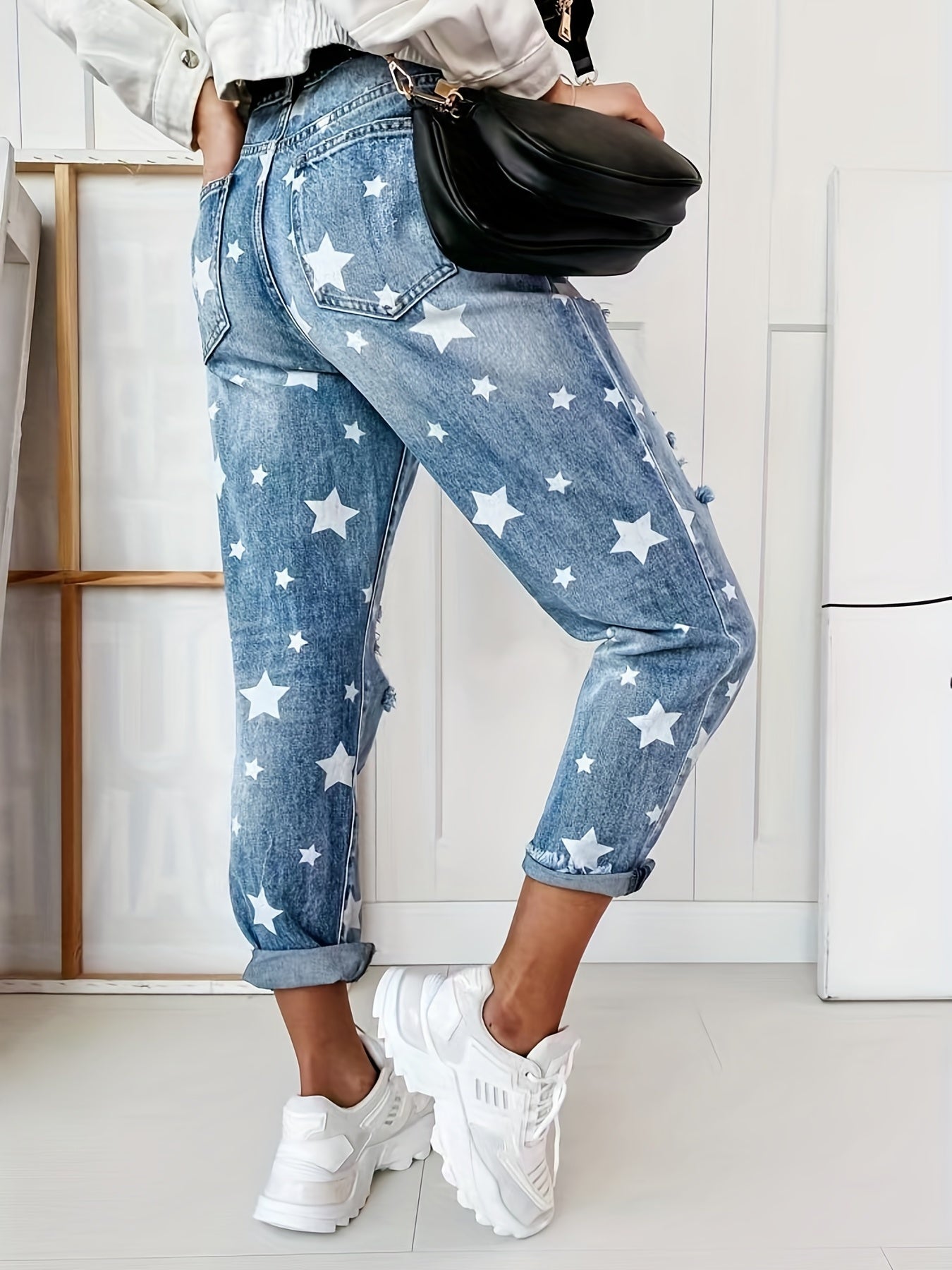 Star Print Ripped High Rise Tapered Leg Jeans