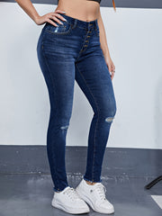 Ripped High Rise Skinny Jeans with Fringe Trim