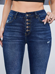 Ripped High Rise Skinny Jeans with Fringe Trim