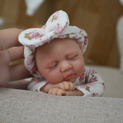 7 Inch Silicone Baby Doll with Pink Bow - Bath Time Mini Doll