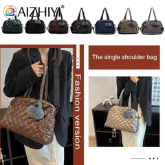 Quilted Shoulder Bag with Pompom Pendant
