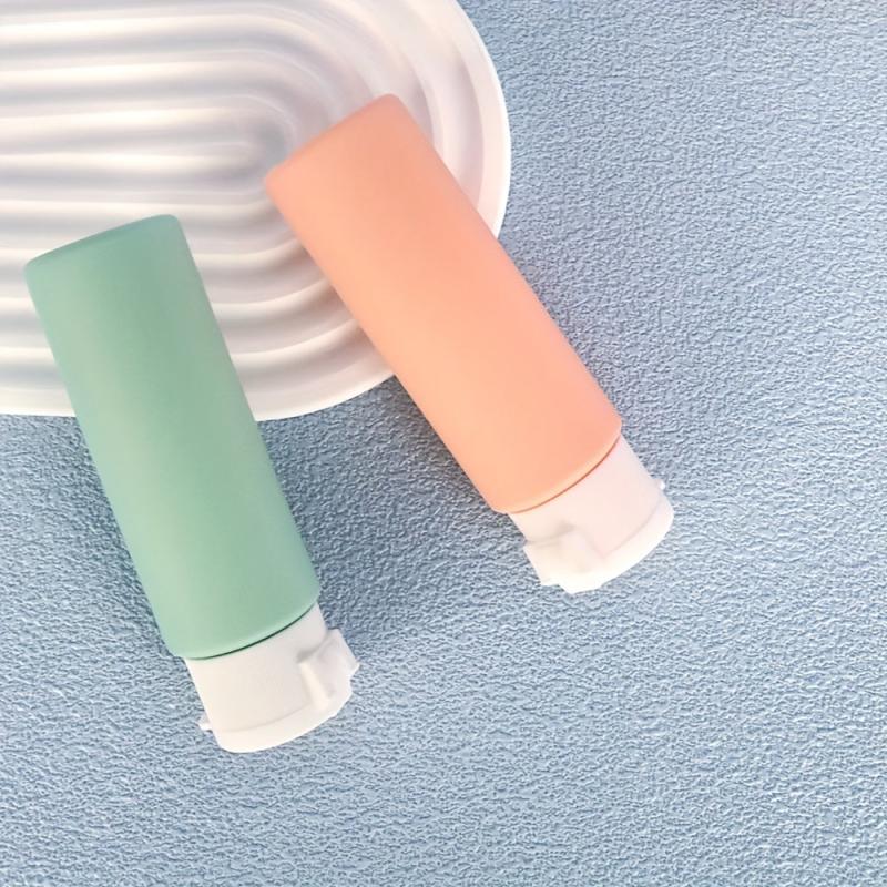 4Pcs Travel Bottles 50ml BPA Leak Proof Refillable Liquid Travel Tubs