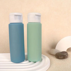 4Pcs Travel Bottles 50ml BPA Leak Proof Refillable Liquid Travel Tubs