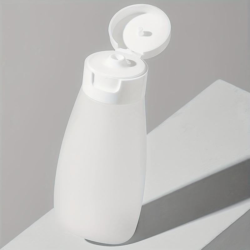 4pcs Travel Bottles Set Leak Proof Refillable Squeeze Cosmetic Sample Container