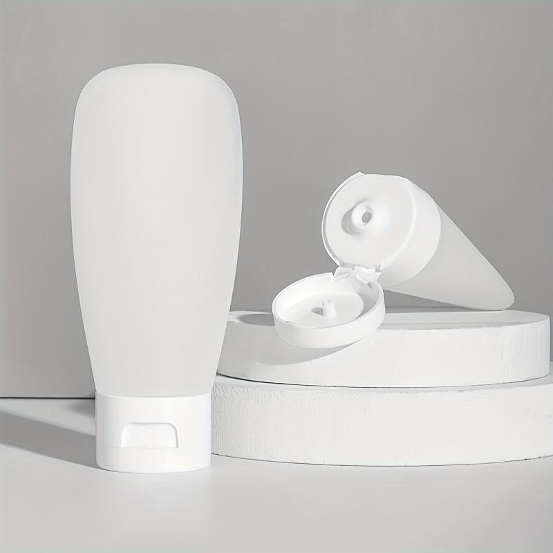 4pcs Travel Bottles Set Leak Proof Refillable Squeeze Cosmetic Sample Container
