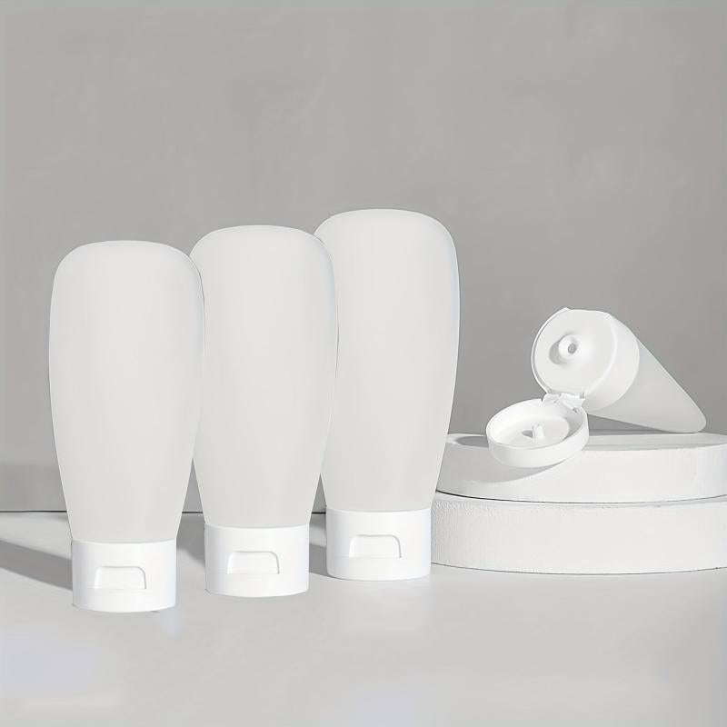 4pcs Travel Bottles Set Leak Proof Refillable Squeeze Cosmetic Sample Container
