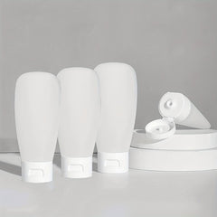 4pcs Travel Bottles Set Leak Proof Refillable Squeeze Cosmetic Sample Container