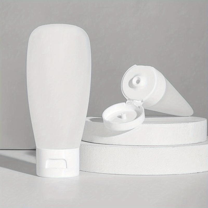 4pcs Travel Bottles Set Leak Proof Refillable Squeeze Cosmetic Sample Container