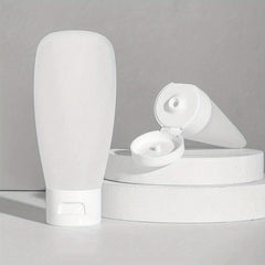 4pcs Travel Bottles Set Leak Proof Refillable Squeeze Cosmetic Sample Container