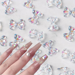 100 Pcs Butterfly Bow Nail Art Rhinestones Crystal Sequins 3D Aurora Charms