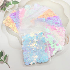 Colorful Snowflake Nail Art with Butterfly Sequins