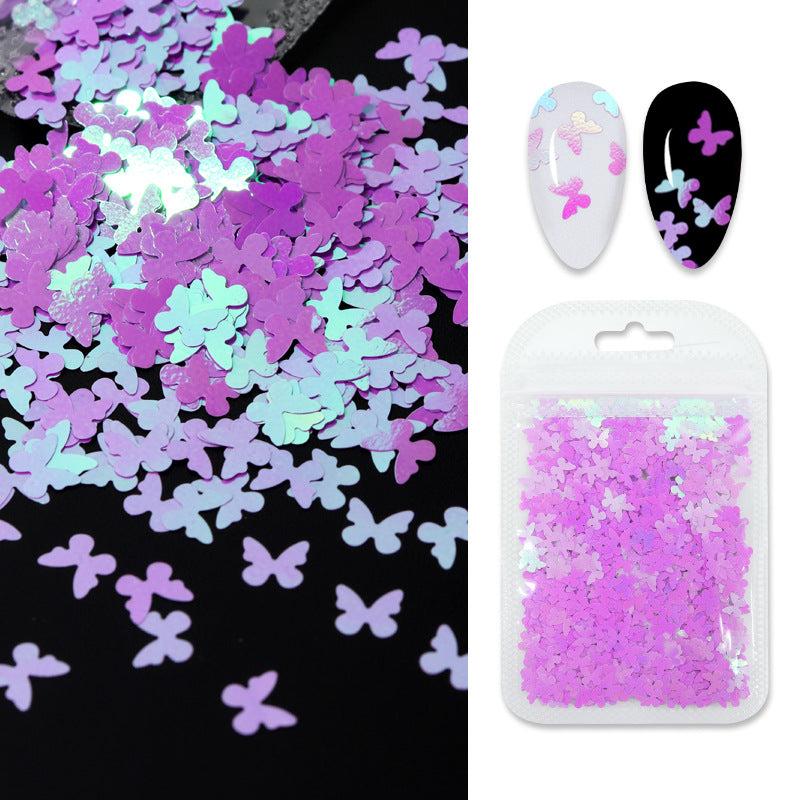 Colorful Snowflake Nail Art with Butterfly Sequins