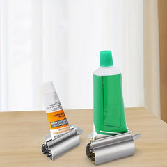 Stainless Steel Toothpaste Squeezer Manual Rotary Holder Facial Cleanser Tool