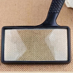 Old People Reading Magnifying Glass