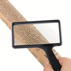 Old People Reading Magnifying Glass