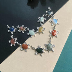 Tortoise Denier Ellipse Crystal Pendant Necklace