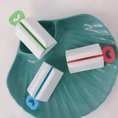 Toothpaste Squeezer Tube Dispenser Rolling Stand