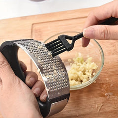 Stainless Steel Garlic Press Easy to Use and Clean for Mincing and Crushing