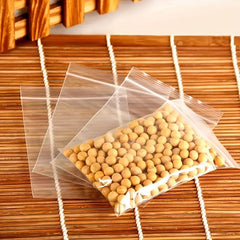 100 Pcs Mini Self Sealing Plastic Bags for Snacks Jewelry Storage