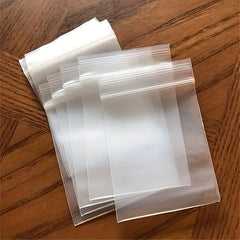 100 Pcs Mini Self Sealing Plastic Bags for Snacks Jewelry Storage
