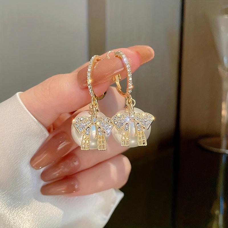 Hollow Bow Faux Pearl Decor Dangle Earrings Zircon Inlaid