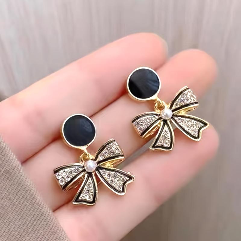 Sparkling Rhinestone Drop Earrings with Bowknot Design