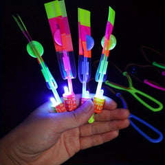 10pcs LED Flying Slingshot Toys Glow In Dark Party Favors