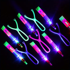10pcs LED Flying Slingshot Toys Glow In Dark Party Favors