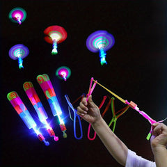 10pcs LED Flying Slingshot Toys Glow In Dark Party Favors