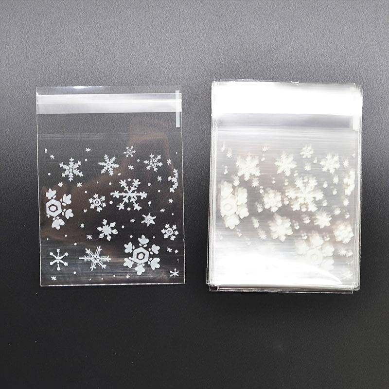 100pcs Snowflake Christmas Plastic Candy Cookie Dessert Packaging Bag