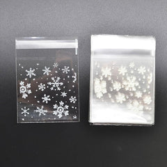 100pcs Snowflake Christmas Plastic Candy Cookie Dessert Packaging Bag