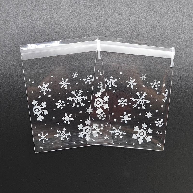 100pcs Snowflake Christmas Plastic Candy Cookie Dessert Packaging Bag