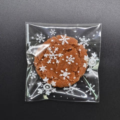 100pcs Snowflake Christmas Plastic Candy Cookie Dessert Packaging Bag
