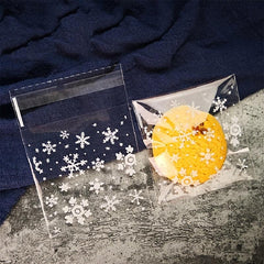 100pcs Snowflake Christmas Plastic Candy Cookie Dessert Packaging Bag