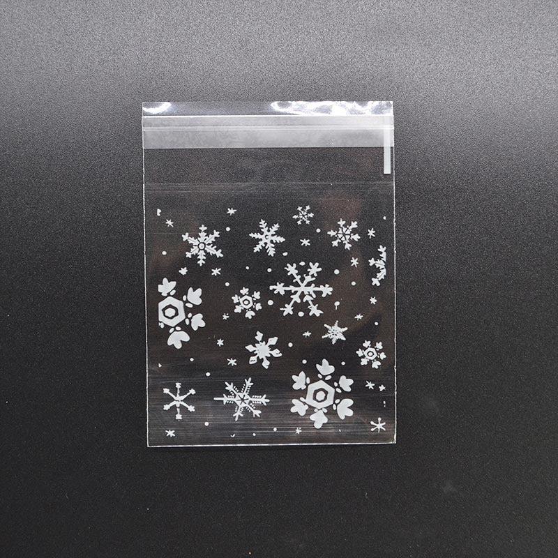 100pcs Snowflake Christmas Plastic Candy Cookie Dessert Packaging Bag