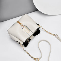 Stylish Bucket Bag with Chain Crossbody Strap and Tassel Detail