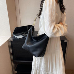 Minimalist Shoulder Bag with Geometric Pattern Strap