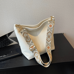 Minimalist Shoulder Bag with Geometric Pattern Strap
