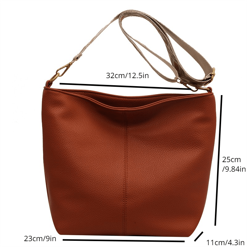Minimalist Shoulder Bag with Geometric Pattern Strap
