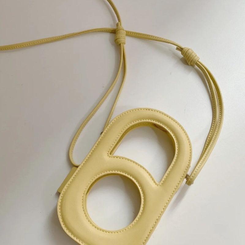 Hollow Out Crossbody Bag & Phone Holder