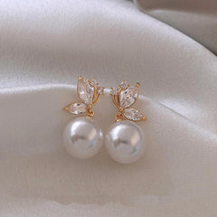 Light Bow Pearl Earrings - Elegant and Chic Jewelry