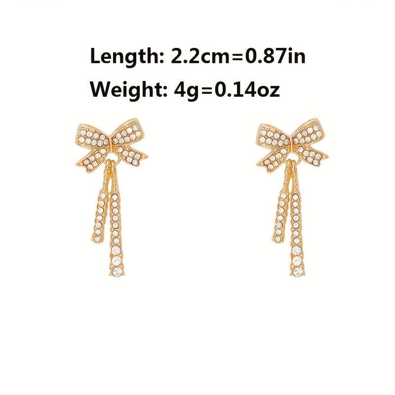 Feminine Celebrity Inspired Long Bow Earrings - Sparkle in Style