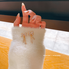 Feminine Celebrity Inspired Long Bow Earrings - Sparkle in Style