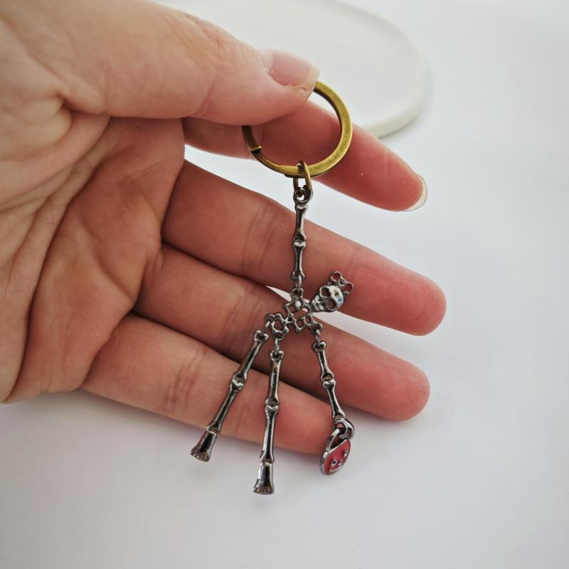 2pcs Halloween Skeleton Earrings & Pumpkin Key Chain Necklace Set