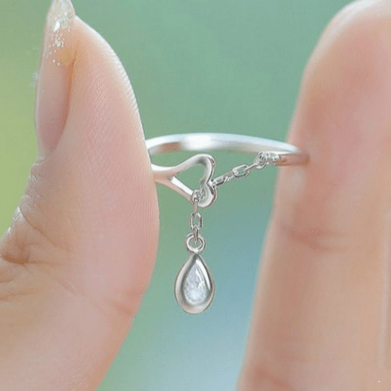 Glistening Silver Water Droplet Ring