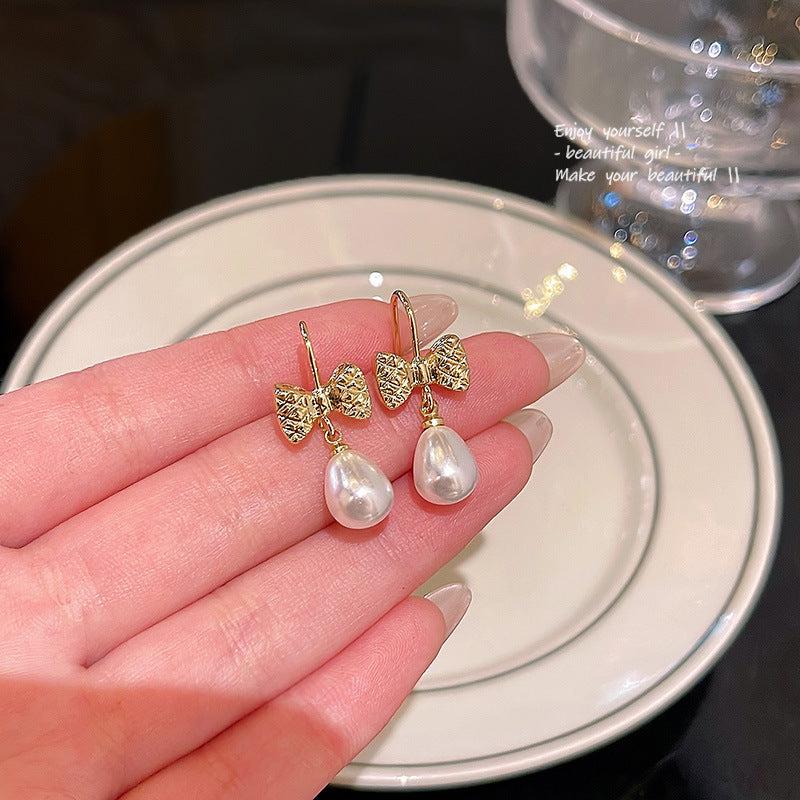 Versatile Pearl Butterfly Knot Earrings