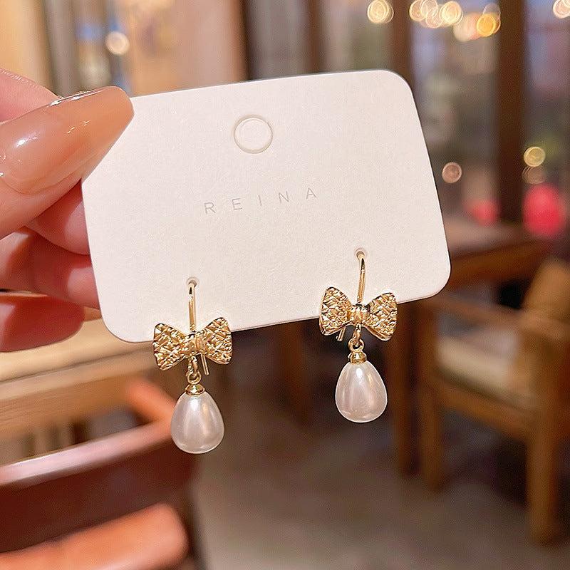 Versatile Pearl Butterfly Knot Earrings