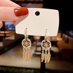 Light Mesh Tassel Drop Earrings with Rhinestone and Feather Details